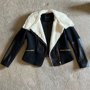 Super flattering jacket with popping details!